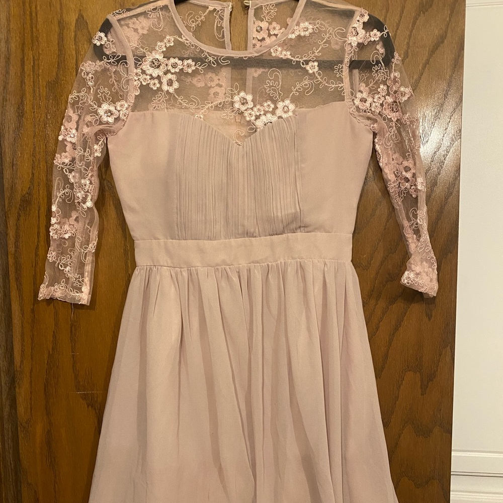 Brand new size 2 London blush colored flared dress. babydoll dress style